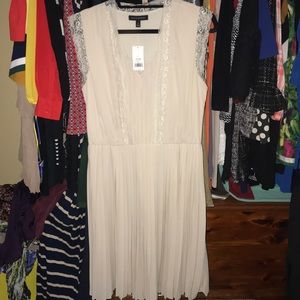 Cream pleated dress NWT